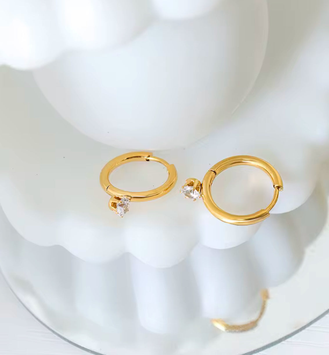 1Tella earrings